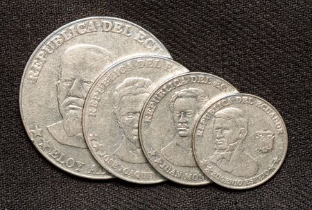 Coins of republic of Ecuador on black background, 50, 25, 5, 10 centavoの写真素材
