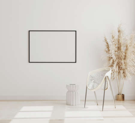 Blank horizontal picture frame mock up on white wall in modern interior background with chair and...