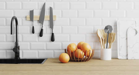 kitchen utensils gadgets near sink on wooden surface and white tiled wall, kitchenware in kitchen...