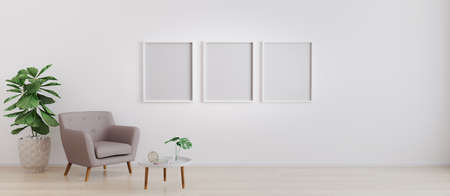 three blank poster frame in bright room with white wall and moderm furniture in scandinavian style...