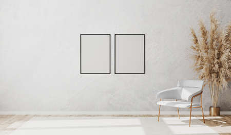 Blank poster frames in bright contemporary empty room interior with luxury white chair on wooden parquet floor and white decorative plaster wall, 3d renderingの写真素材