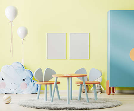 Poster frame mock up in bright yellow child room with table, toys and cupboard, kids room interior mockup, children playroom, 3d renderingの写真素材
