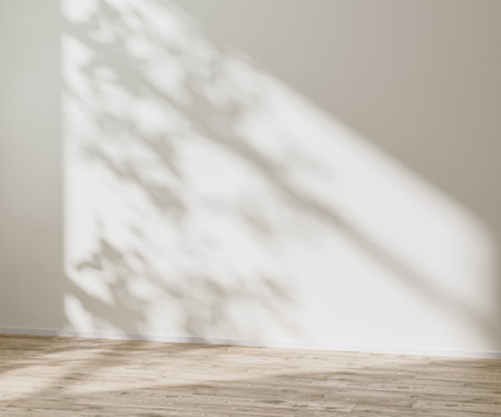 empty room mock up with wooden floor and empty white wall with sunlight and leaves shadow, 3d renderingの写真素材