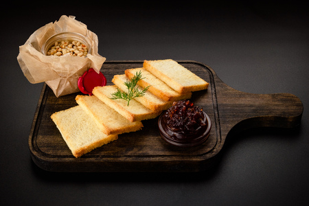Chicken homemade pasta from the liver or pate with sliced whole-grain bread, served in a glass jar...