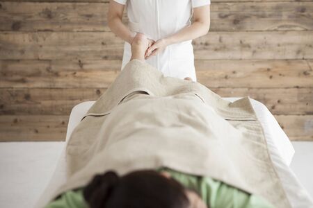 Woman to be a massage the back of the legsの写真素材