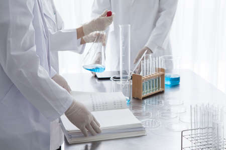 Three scientists who work calmly