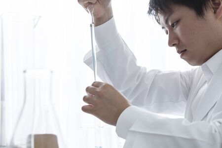 Male chemist for the research of liquid
