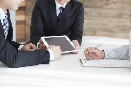Image of laughing confident people planning a business-strategyの写真素材