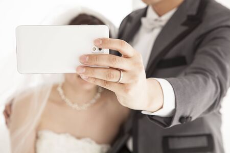 Couples take a picture before the weddingの写真素材