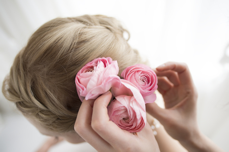 Bride is wearing a flower hair ornamentsの写真素材