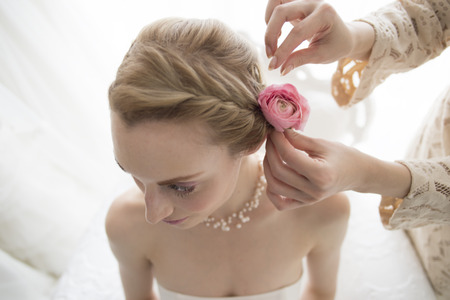 Beautiful women who are asked to put a flower hair ornaments