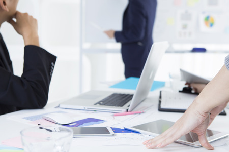 Businessman have an announcement using the whiteboardの写真素材