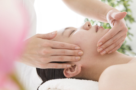 Face line massage for womenの写真素材