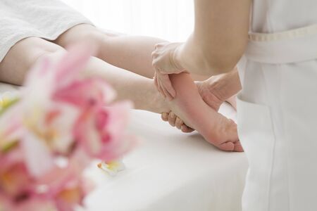 Woman to be the heel massage at the storeの写真素材