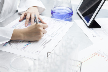 Female researcher summarizes the research results