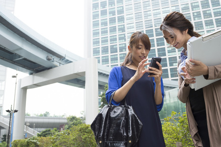 Female company employee in the office districtの写真素材