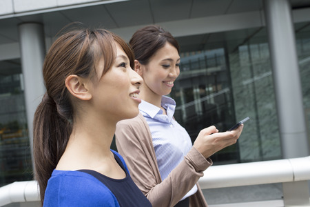 Female company employee in the office districtの写真素材