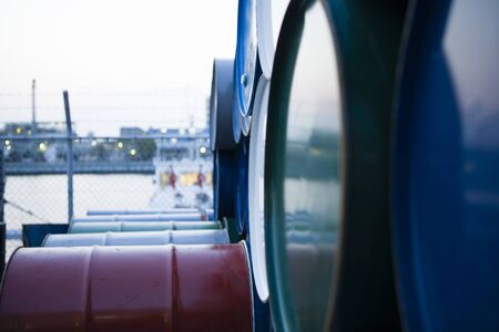 Oil drums, pile upの写真素材