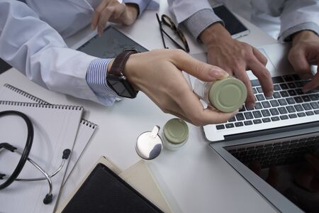 Conference and two of the doctors of the new drugの写真素材