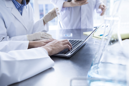 Scientists to discuss the research results of today.の写真素材