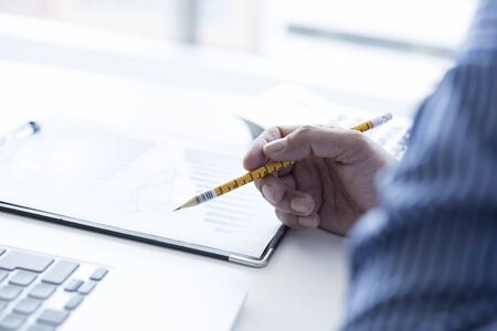 Business man with a pencil.の写真素材