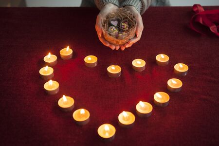 Women handing chocolateの写真素材
