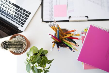 On the desk of the designer.