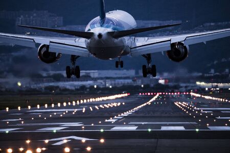 Close-up picture of the back of the airplane arriving at the airport.の写真素材