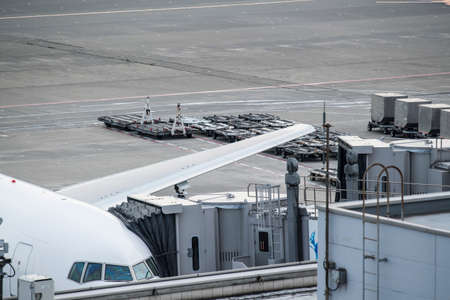 An airplane undergoing maintenance at the airfield.の写真素材