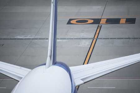 The back of an airplane stopped at the airport.の写真素材