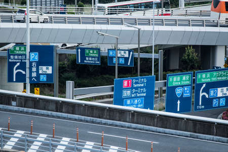 Many signboards on the road.の写真素材