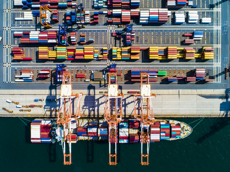 Container warehouse and container ship of harbor.の写真素材
