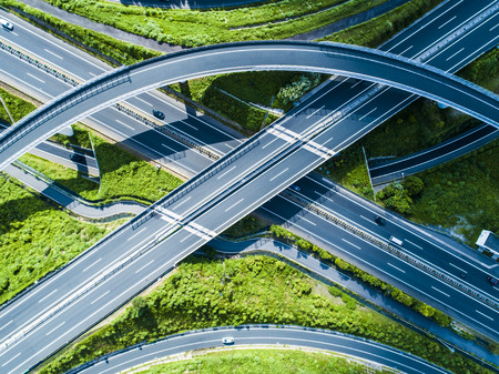 Three-dimensional intersection down the road. A cityscape with nature.