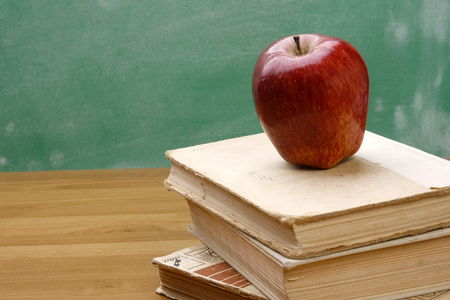 apple over books.の写真素材