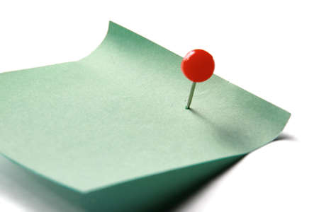 Green paper note on white background isolated.の写真素材