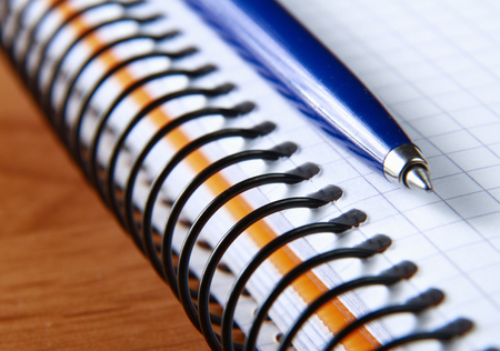 Notebook and pen.