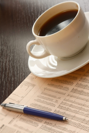 Cup of coffee near pressの写真素材