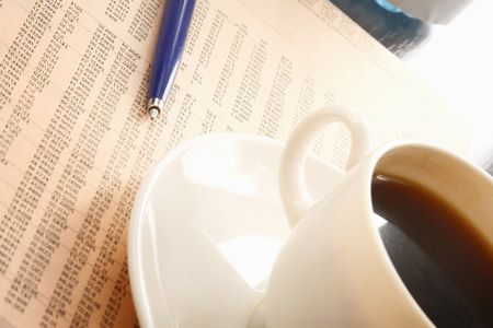 Cup of coffee near pressの写真素材