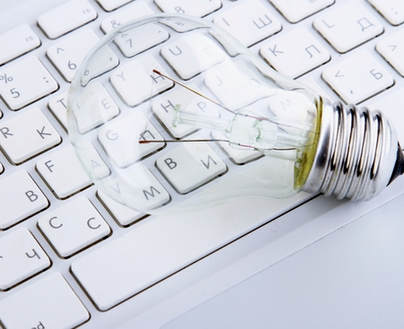 Light bulb and computer keyboardの写真素材