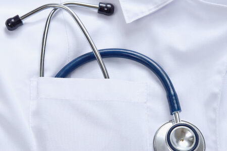 A medical stethoscope in a doctor&amp;#39;s pocketの写真素材