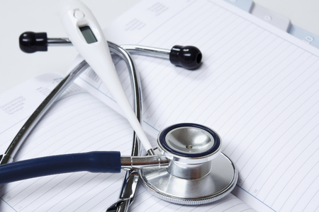 Stethoscope with reference booksの写真素材