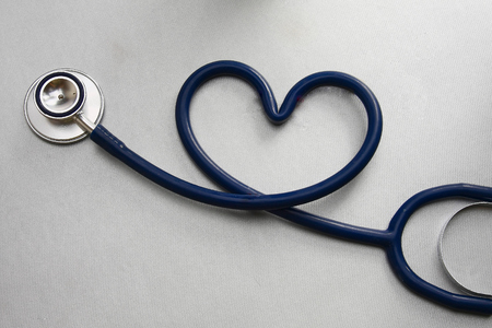 A stethoscope in the form of a heartの写真素材