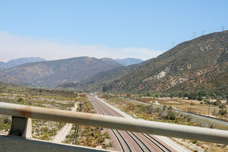 View of mountains and a road from the bridge
