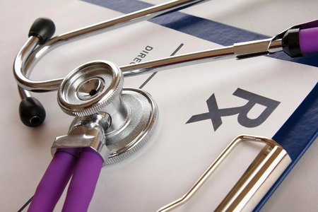 Stethoscope and RX prescription close-up viewの写真素材