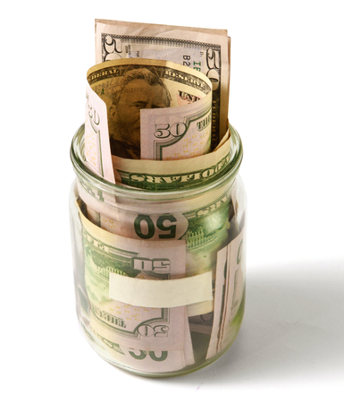 money on the bottle,dollar,isola ted on white backgroundの写真素材