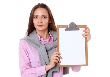 Woman showing a blank page of clipboard .の写真素材