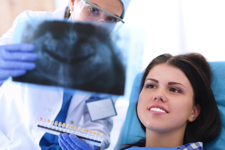 Shot of a woman having a checkup at the dentist