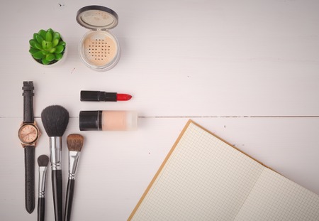 Makeup brush and cosmetics, on a white backgroundの写真素材