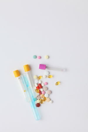 Medical stethoscope and l pills on desk. Medical stethoscope.の写真素材