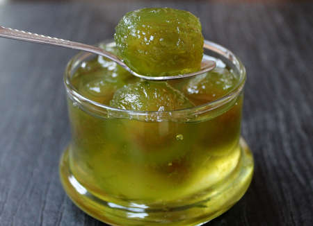Jam of green fig in a glass jam bowl